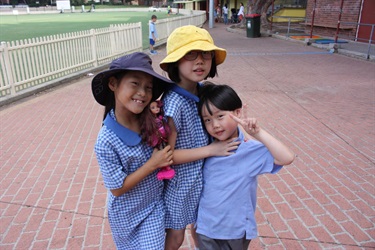 Children smiling for camera at Chatswood Oval