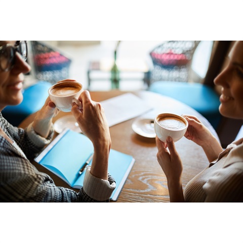 2 women drinking coffee